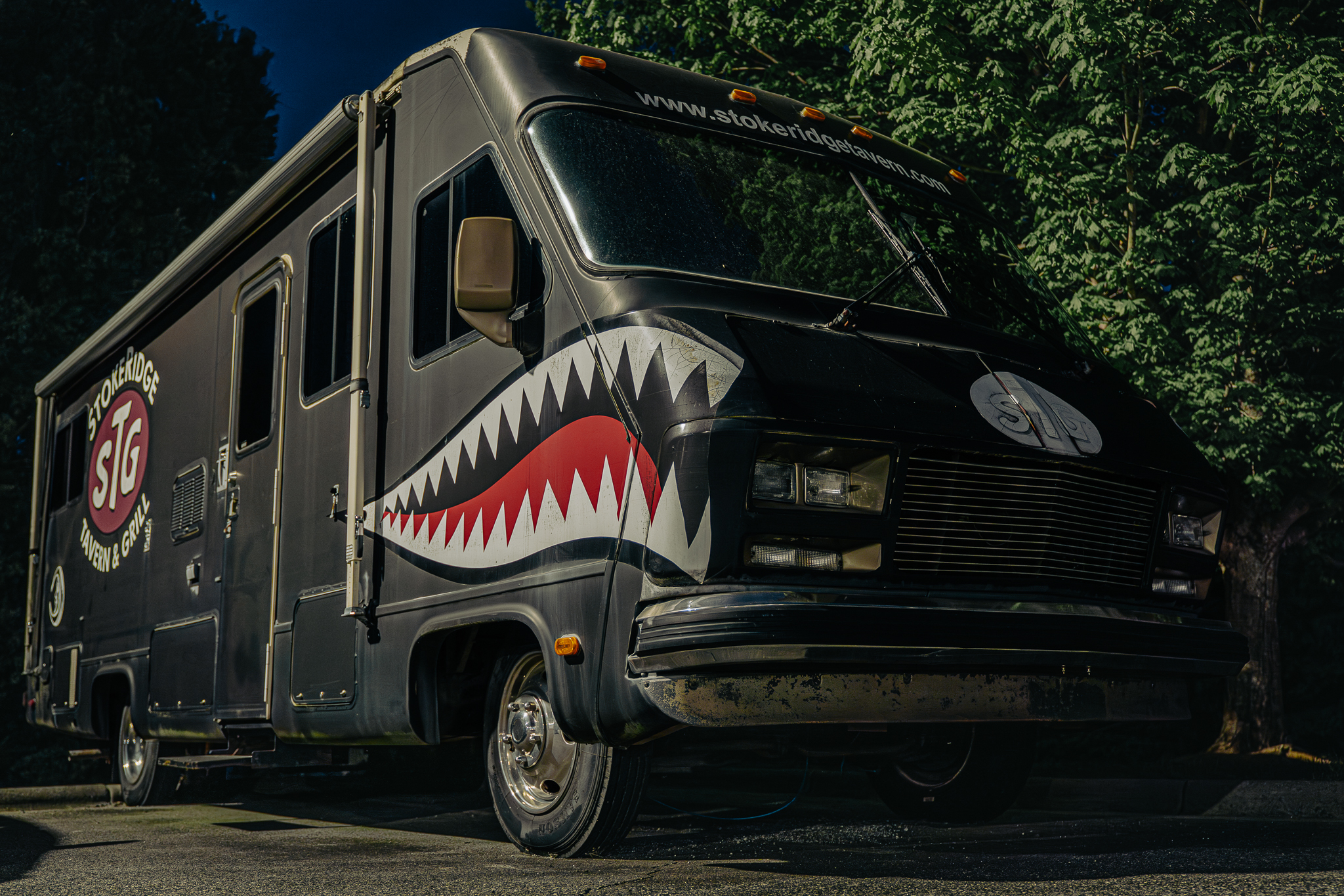 The StokeRidge RV, our mascot, parked on the patio